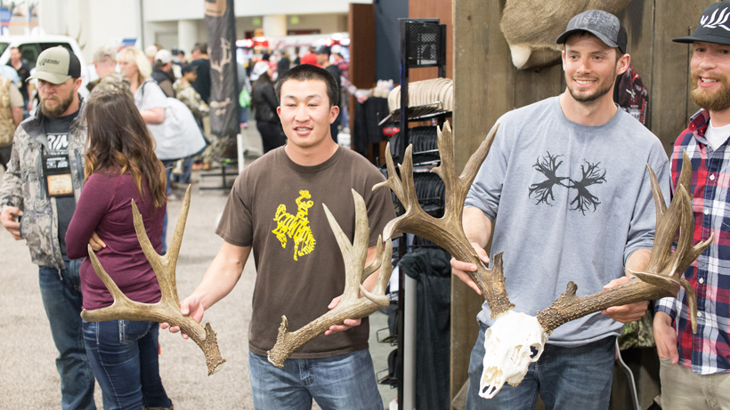 Garrett Nix with the poached buck at the Western Hunting Expo Garrett Nix with the poached buck at the Western Hunting Expo