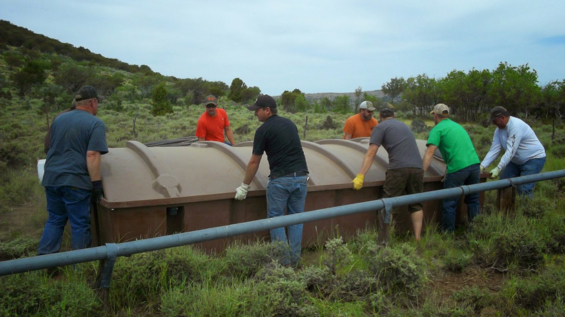 Rocky Mountain Elk Foundation volunteers on a water tank project Rocky Mountain Elk Foundation volunteers on a water tank project