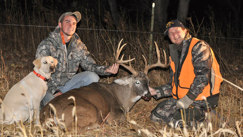 Stephen Spurlock and his dad with a whitetail buck Stephen Spurlock and his dad with a whitetail buck