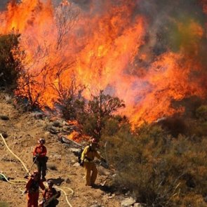 Wildfires rage across the West